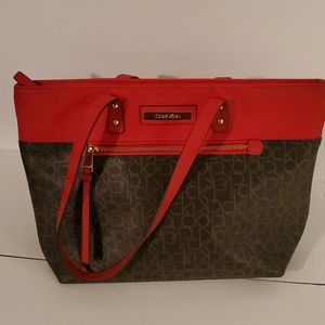 Orange and brown Calvin Klien signature Purse